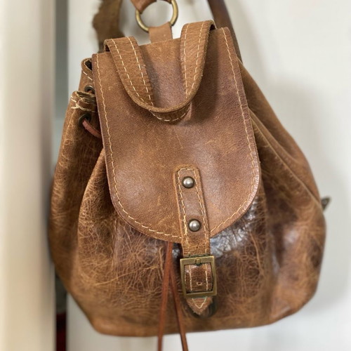 Leather backpack small used, tan color