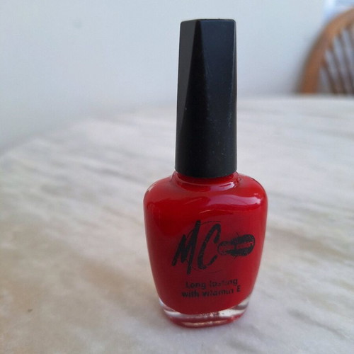 Manoli MC red nail polish like new