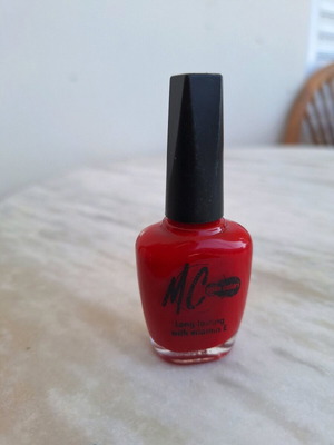 Manoli MC red nail polish like new