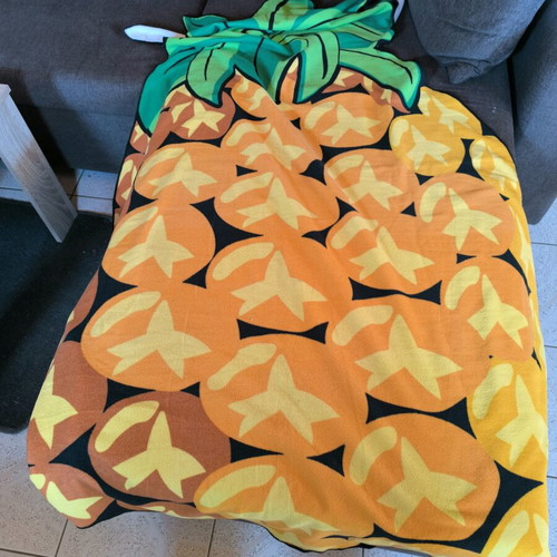Beach towel used in pineapple shape