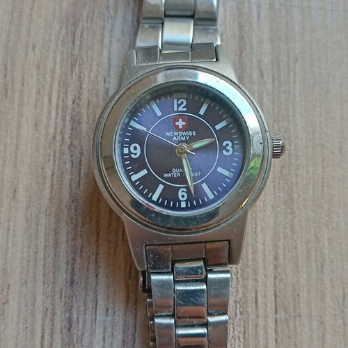 Swiss miniature battery watch like new