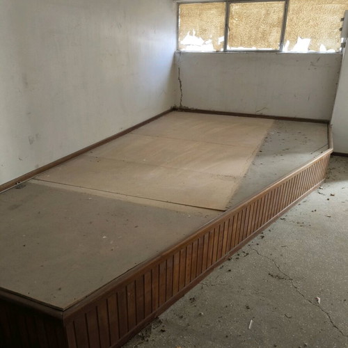 Raised floor used for desk or bed placement