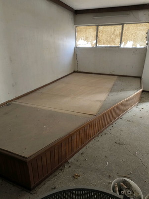 Raised floor used for desk or bed placement