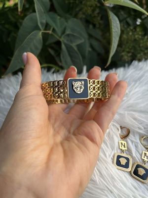 Princess stainless steel bracelet and earrings set like new, black and gold