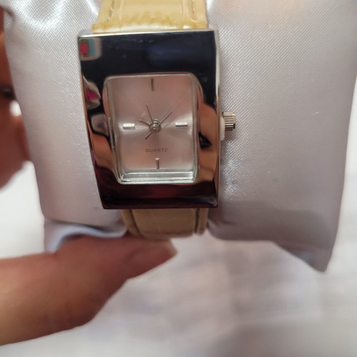 Quartz wristwatch, beige, new