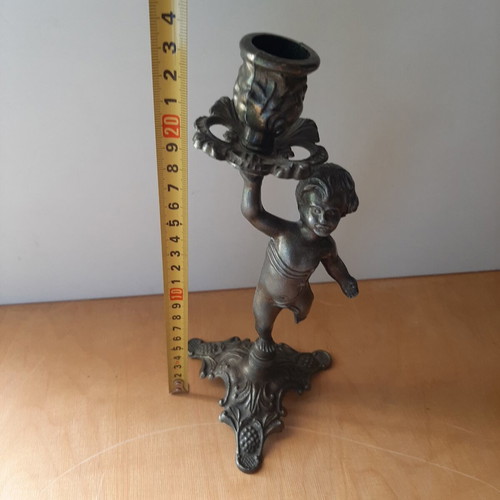 Vintage metal candlestick with boy figure like new