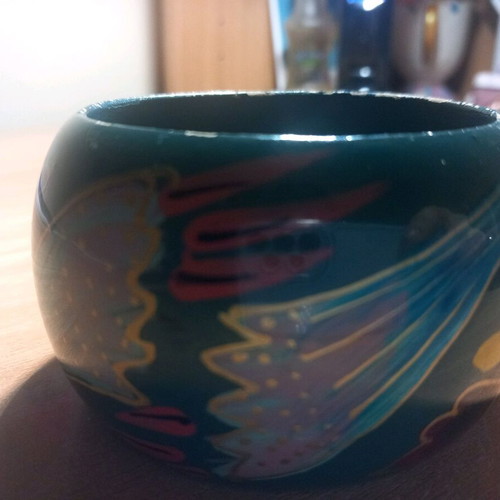 Wooden bracelet used with painted design