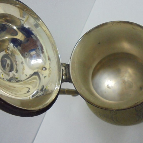 Old bronze teapot with decorative ornaments