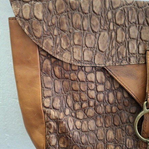 Vintage cowboy leather shoulder bag with metal accents like new