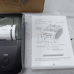 Portable thermal receipt printer