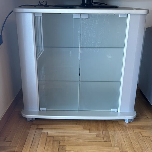 TV cabinet with LG TV, white, glass doors and shelves