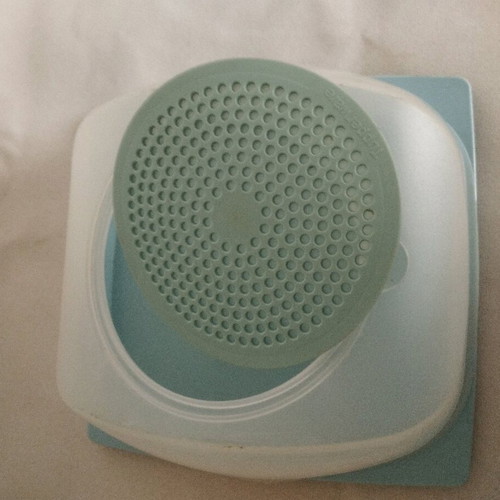 Tupperware cheese container used