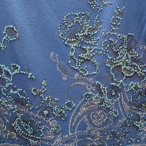 T-shirt used one size turquoise with embossed design
