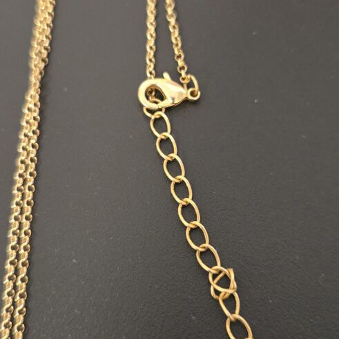 Long necklace with green charm like new