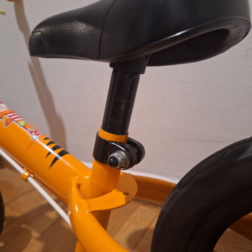 Balance bike for children, orange, adjustable height