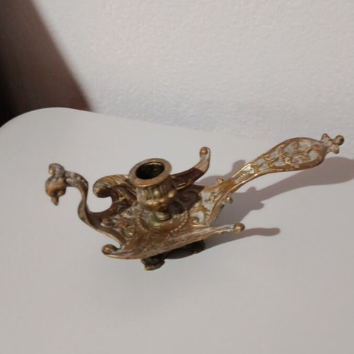 Bronze candlestick used, baroque style with embossed decoration