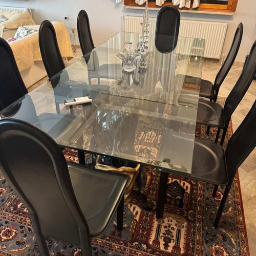 Dining table with 8 leather chairs and sideboard like new