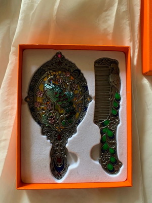 Hand mirror and comb set new with colorful carved design
