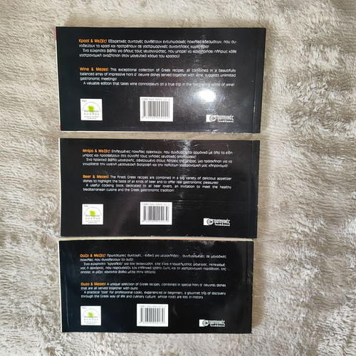 Set of 3 bilingual cookbooks like new, mezes for wine, beer & ouzo