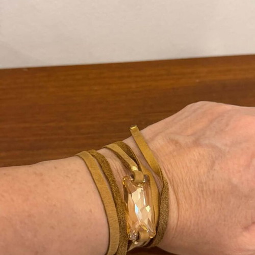 Leather bracelet with crystal in beige and gold tones, like new