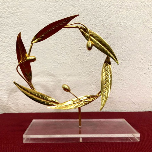 Handmade decorative wreath used on plexiglass base