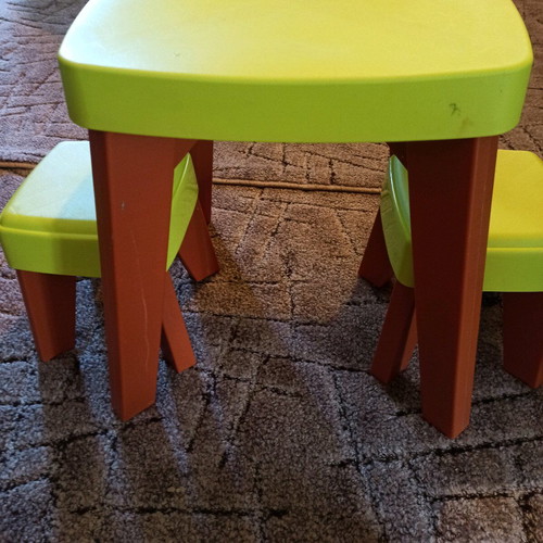 Plastic table set with 2 stools like new, green for toddlers