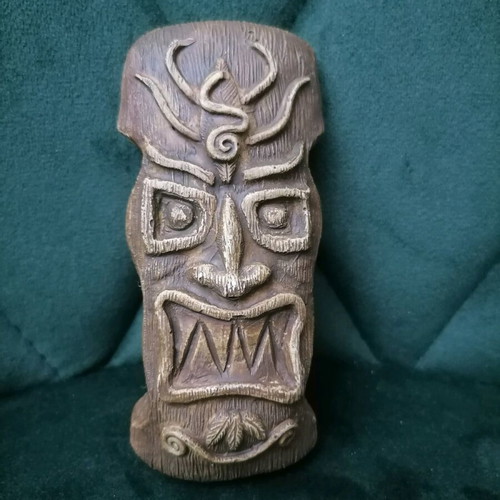 Handmade gypsum magnets and hanging totems painted with acrylics