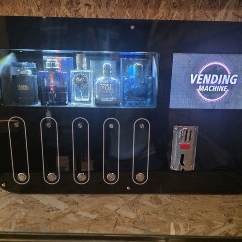 Automatic perfume vending machine with touchscreen and coin acceptor