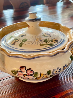 Handmade ceramic fondue pot used with plant motifs