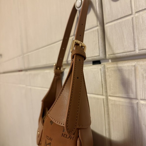 Nolah shoulder bag in camel and brown with monogram design