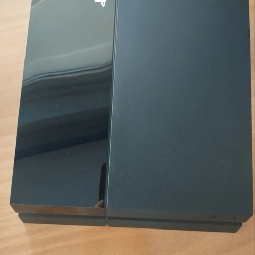 Sony PlayStation 4 Fat 500GB console with DualShock controller