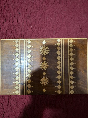 Handmade wooden jewelry box used with Ukrainian folk art