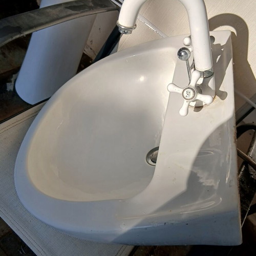 Gravena bathroom sink with built-in faucet like new