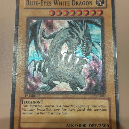 Blue-Eyes White Dragon 1st Edition YuGiOh card poor condition