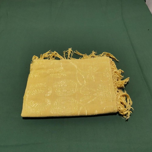 Sofa throw or blanket used with signs of wear, circa 1930