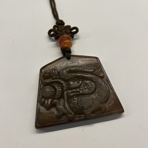 Pendant necklace with carved brown jade dragon, like new