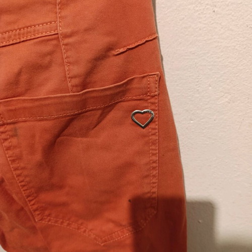 Please Italian orange jeans size M used