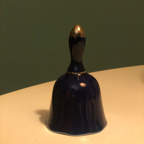 Porcelain bell with hand-painted design like new