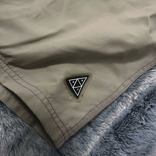 Huf Swim short running like new, size M-L, beige and purple