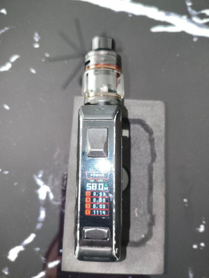 GeekVape Aegis Legend e-cigarette used with Zeus Sub-Ohm Tank and batteries