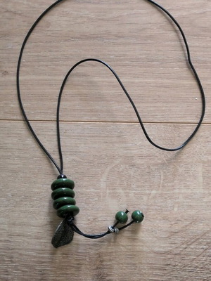 Long necklace used with green beads