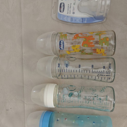 Medela Swing and Symphony electric breast pump with Chicco glass bottle