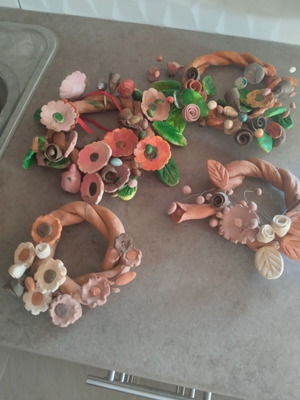 Clay wall decorations set of 4 like new