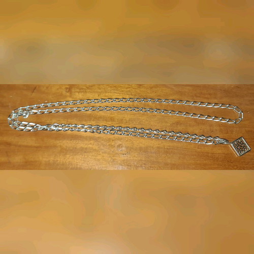 Metal women's belt like new, adjustable