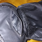 Backpack black leather type used with multiple pockets