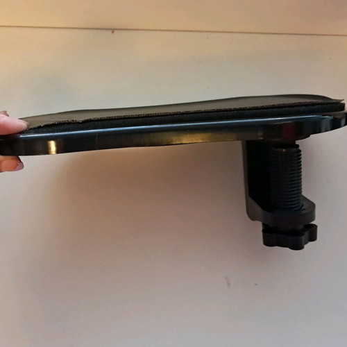 Office armrest base used, black plastic
