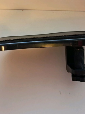 Office armrest base used, black plastic