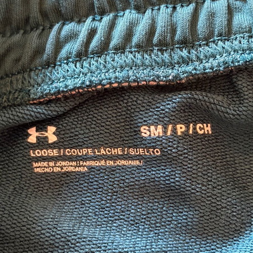 Under Armour green sweatpants with white drawstrings like new