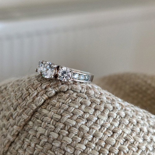 Trilogy silver plated ring used with zircon and heart motifs