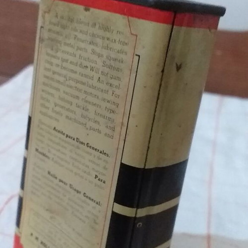 Set of 4 used oil collectors with iron, tin, and plastic